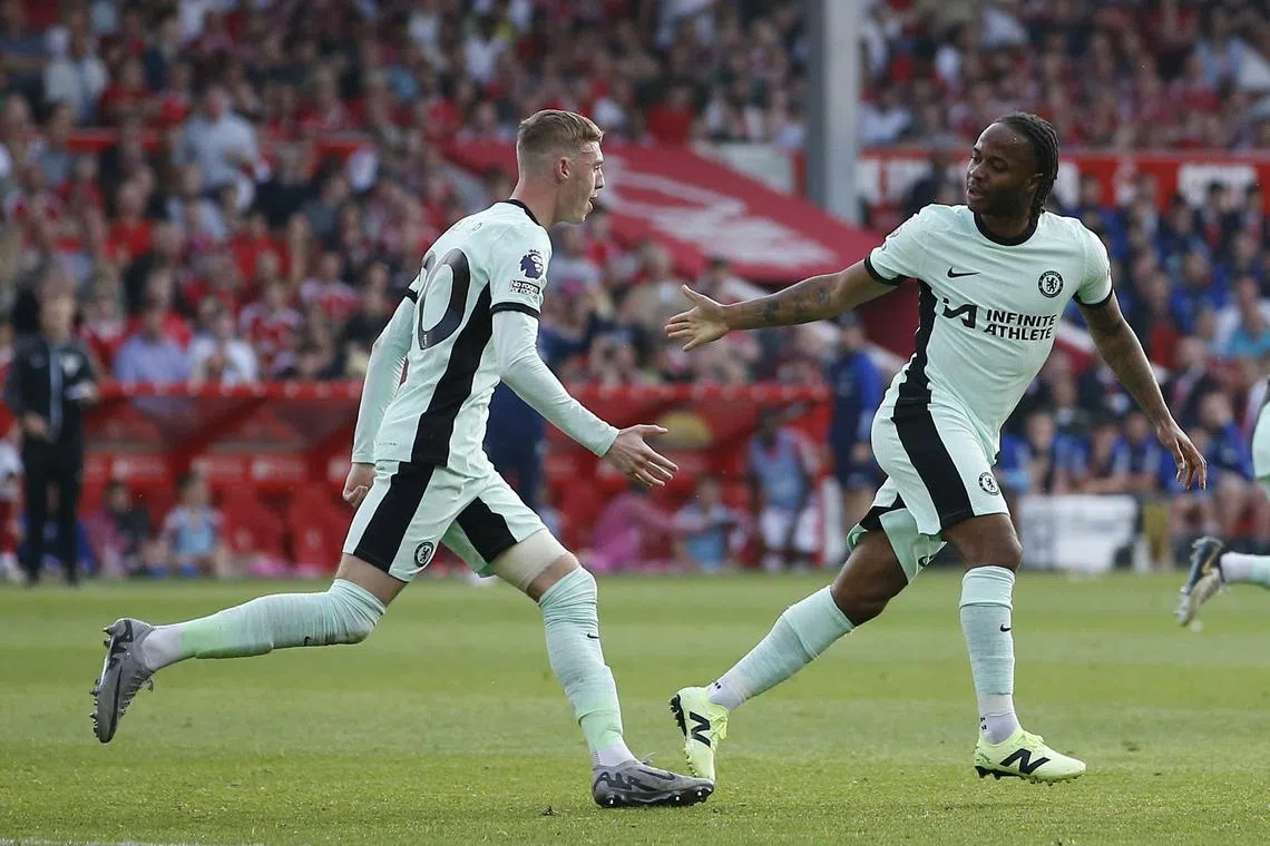 Soccer Football - Premier League - Nottingham Forest v Chelsea - The City Ground, Nottingham, Britain - May 11, 2024 Chelsea's Raheem Sterling celebrates scoring their second goal with Cole Palmer Action Images via Reuters/Craig Brough