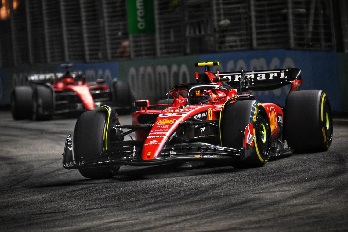 Carlos Sainz of Scuderia Ferrari (foreground) and Charles Leclerc of Scuderia Ferrari in action at the Formula One Singapore Airlines Singapore Grand Prix at Marina Bay street circuit on Sept 17.