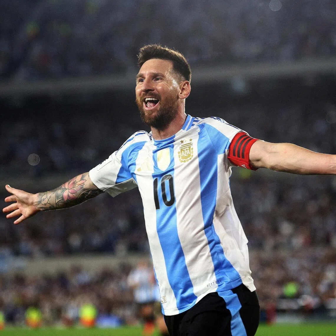 Argentina's Lionel Messi celebrates scoring against Bolivia in a World Cup qualifier in 2024.