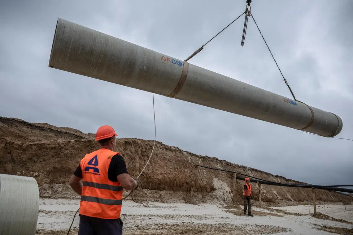 Work is carried out in August 2023 to restore the water system to about one million people were cut off after the Kakhovka dam was destroyed.