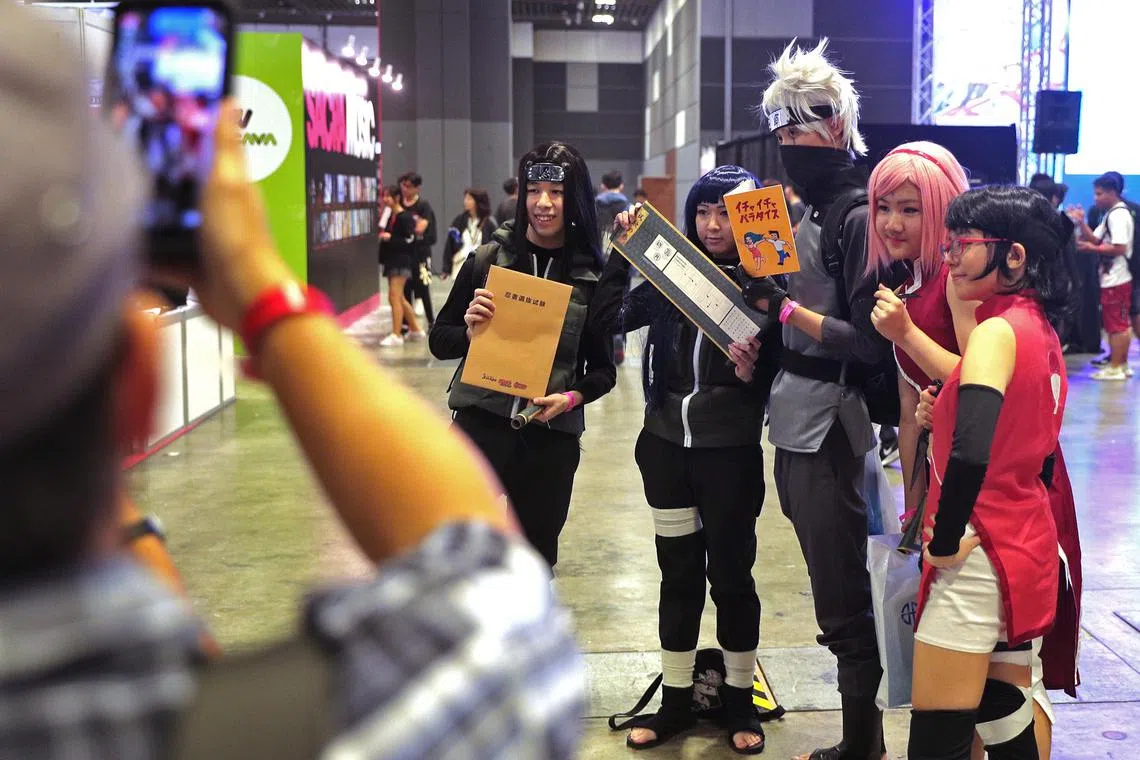 A photo from Nov 29, 2019, shows cosplayers dressed as characters from Naruto at the C3 Anime Festival Asia Singapore at Suntec Convention Centre.