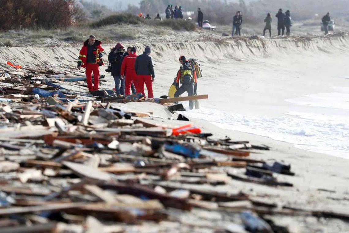 FILE PHOTO: Rescuers get ready to search for survivors in the aftermath of a deadly migrant shipwreck in Steccato di Cutro near Crotone Italy, February 28, 2023. REUTERS/Remo Casilli//File Photo