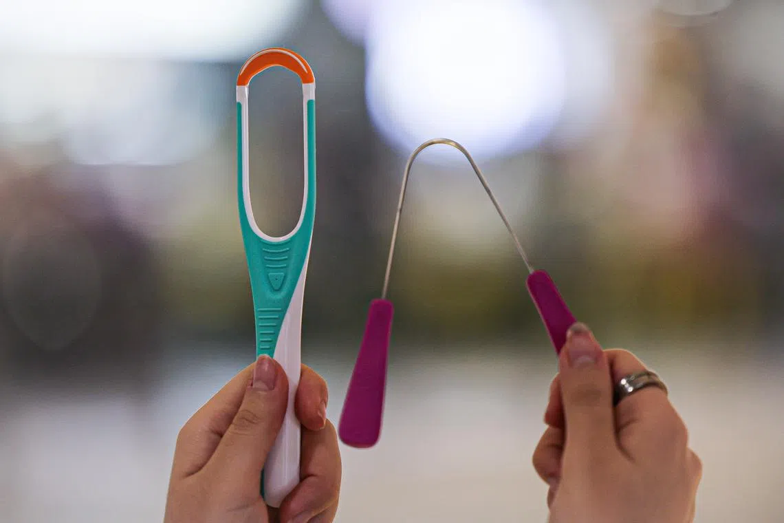Use purpose-built tools and not household items to clean your tongue, say dentists. 
