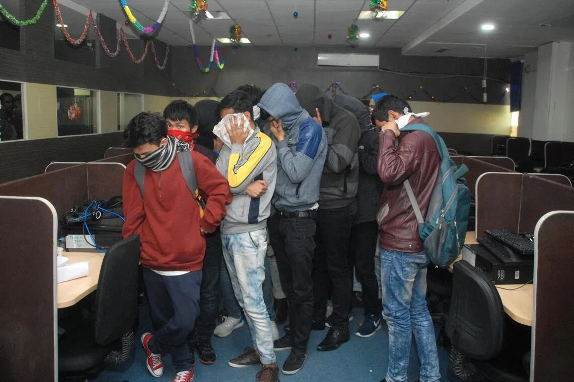 Suspected scammers caught at a call centre in Noida in India's northern state of Uttar Pradesh in 2018