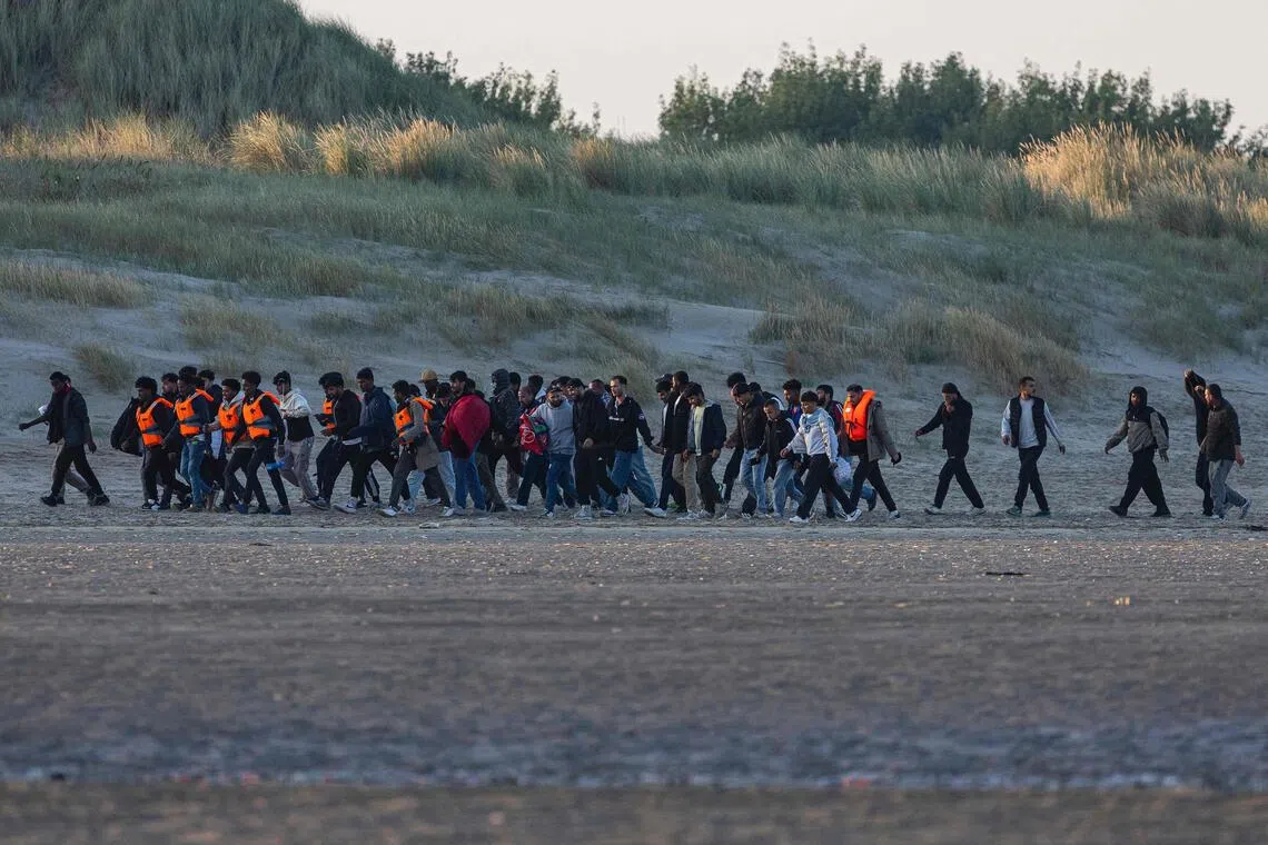 Man found shot dead in UK van transporting migrants in France