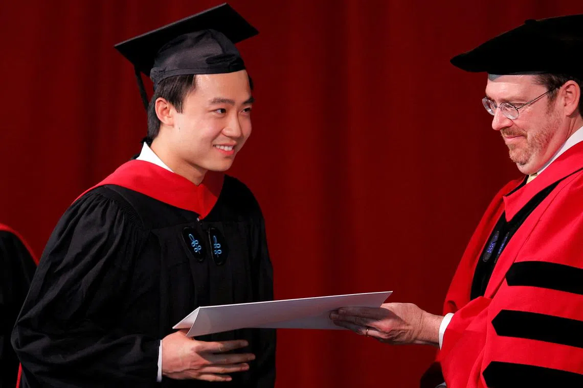 FILE PHOTO: Bo Guagua, son of fallen Chinese politician Bo Xilai, receives his masters degree in public policy at Harvard University in Cambridge, Massachusetts May 24, 2012. REUTERS/Brian Snyder/File Photo