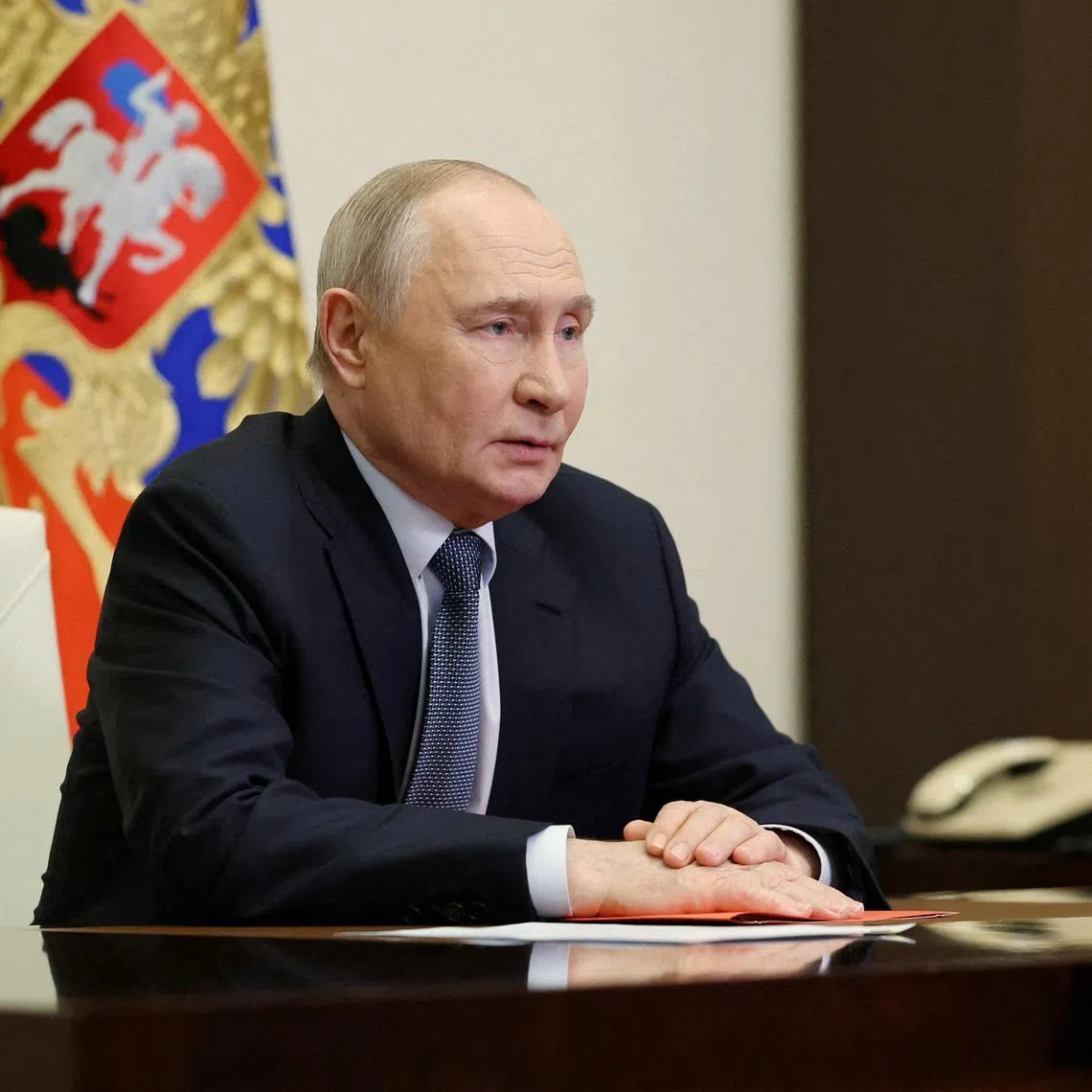 FILE PHOTO: Russian President Vladimir Putin chairs a meeting with members of the Security Council via a video link at the Novo-Ogaryovo state residence outside Moscow, Russia, April 17, 2026. Sputnik/Pool via REUTERS/File Photo