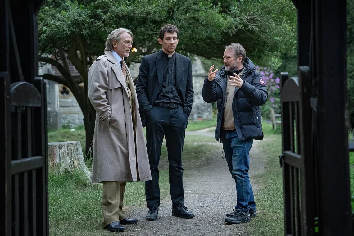 (From left) Daniel Craig, Josh O’Connor and writer-director Rian Johnson on the set of Wake Up Dead Man: A Knives Out Mystery.