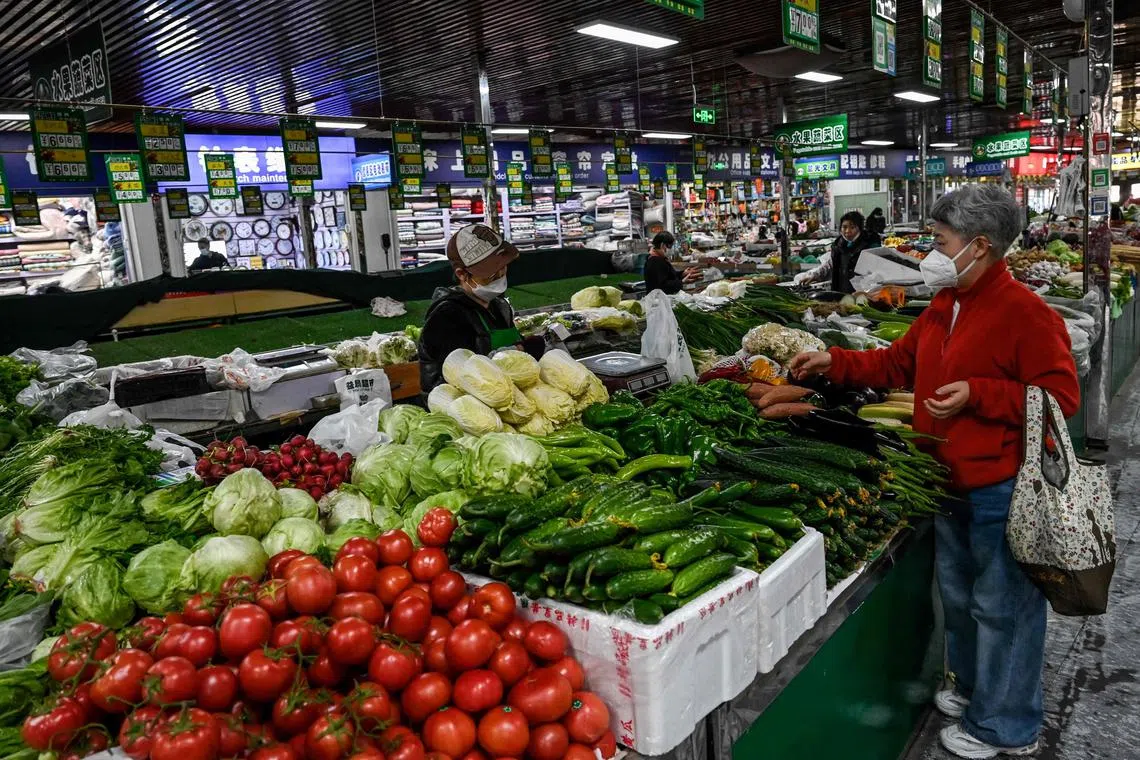 China's consumer price index inched up 0.1 per cent last month from a year earlier, compared with a 0.7 per cent rise in March.