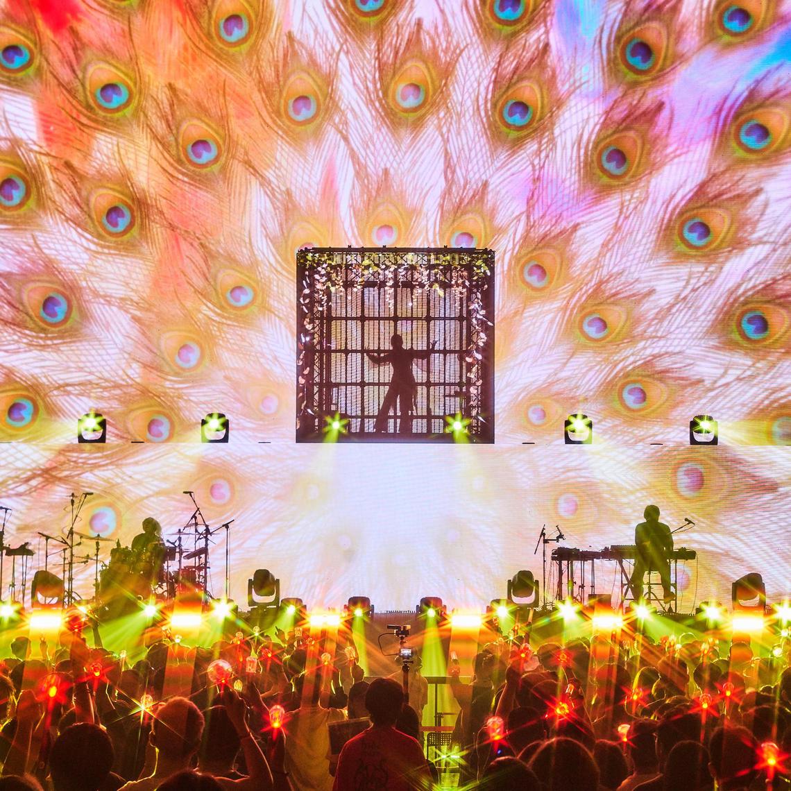 The mysterious J-pop singer Ado, who has never revealed her face, performed while obscured in a box onstage for her sold-out show at the Singapore Indoor Stadium on May 21. 