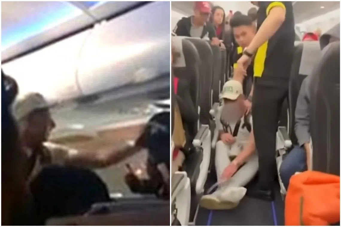 In videos circulating online, the man’s slap appears to have caused the other passenger’s cap to be knocked off his head.