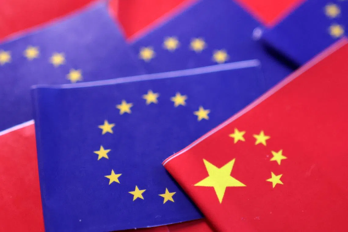 FILE PHOTO: EU and Chinese flags are seen in this illustration taken, March 20, 2025. REUTERS/Dado Ruvic/Illustration/File Photo