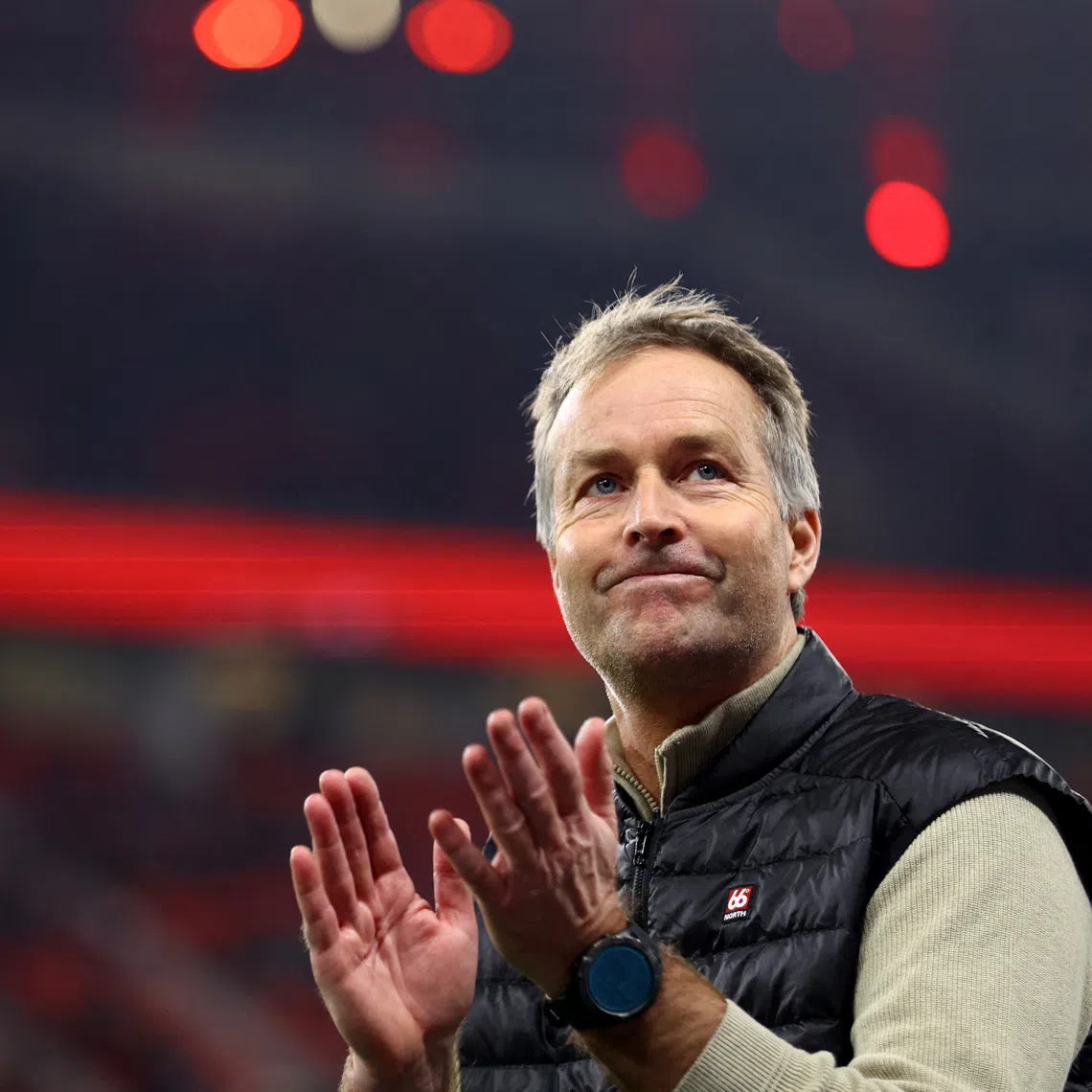 Soccer Football - Bundesliga - Bayer Leverkusen v FC Cologne - BayArena, Leverkusen, Germany - December 13, 2025 Bayer Leverkusen coach Kasper Hjulmand applauds fans before the match REUTERS/Thilo Schmuelgen