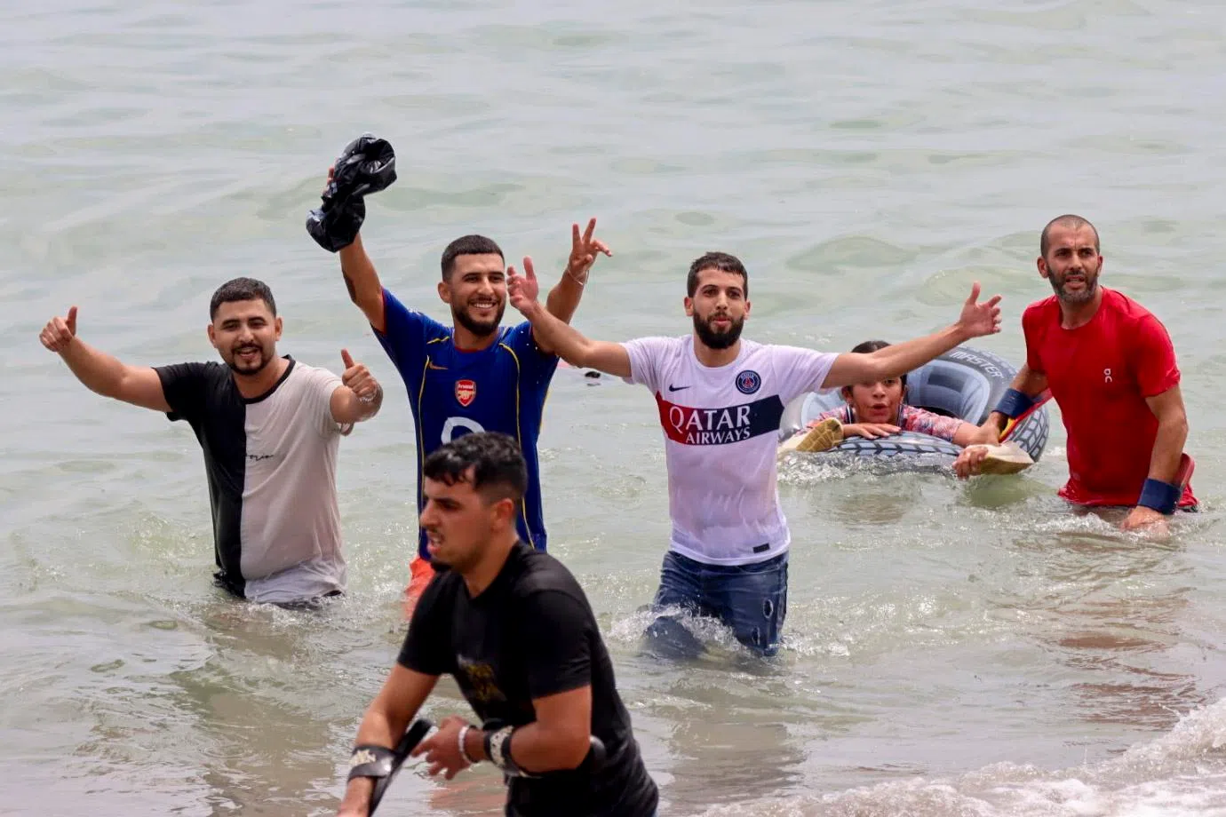 Migrants reach Spanish territory after swimming from Morocco to Ceuta, a Spanish enclave in North Africa, on July 30.