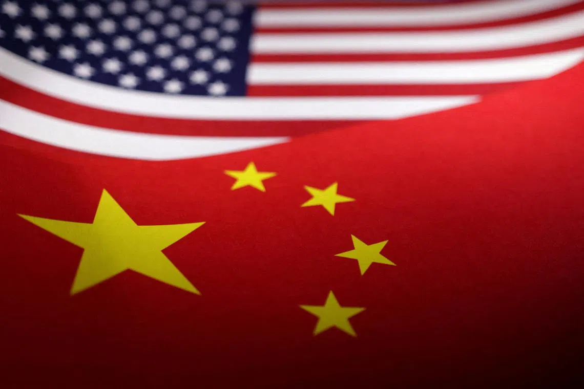 FILE PHOTO: U.S. and Chinese flags are seen in this illustration taken, April 24, 2024. REUTERS/Dado Ruvic/Illustration/File Photo