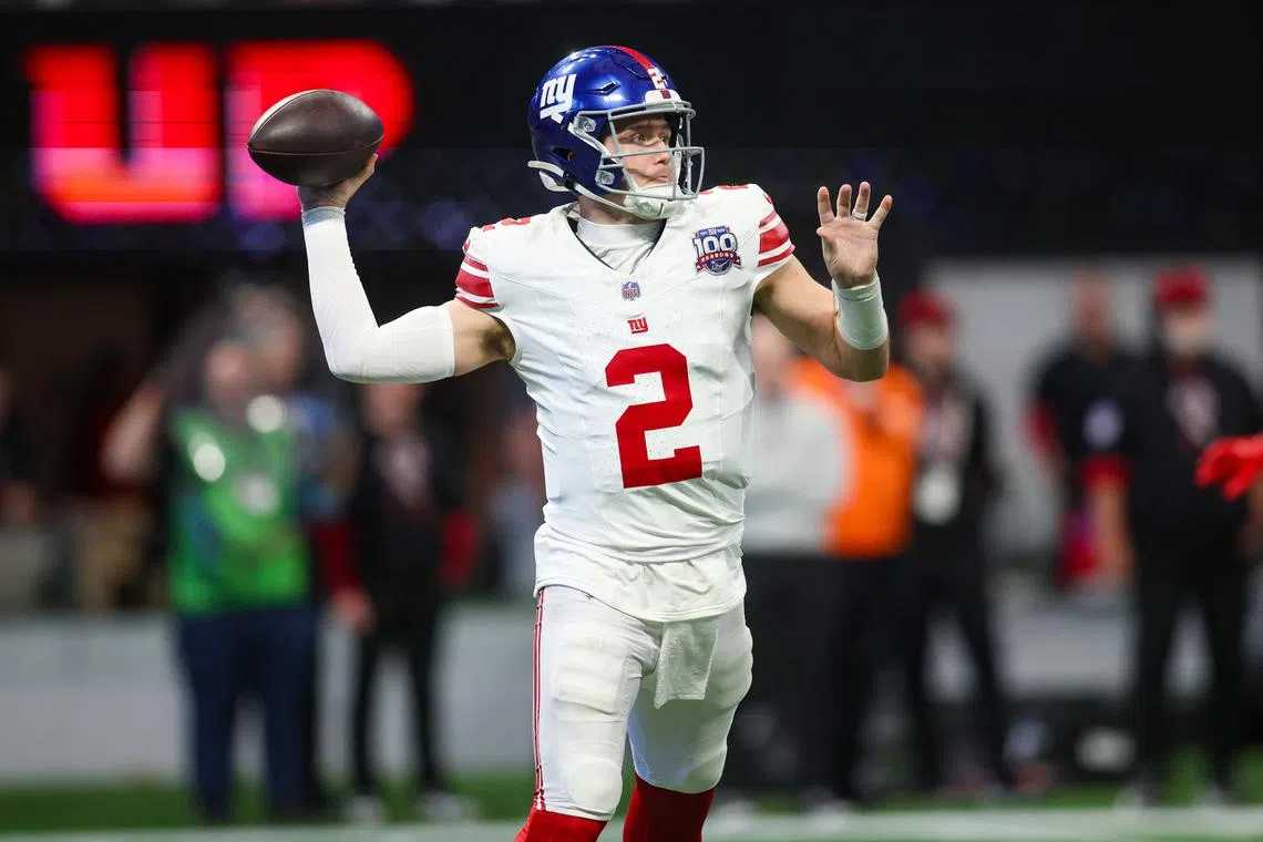 FILE PHOTO: Dec 22, 2024; Atlanta, Georgia, USA; New York Giants quarterback Drew Lock (2) throws a pass against the Atlanta Falcons in the third quarter at Mercedes-Benz Stadium. Mandatory Credit: Brett Davis-Imagn Images/File photo