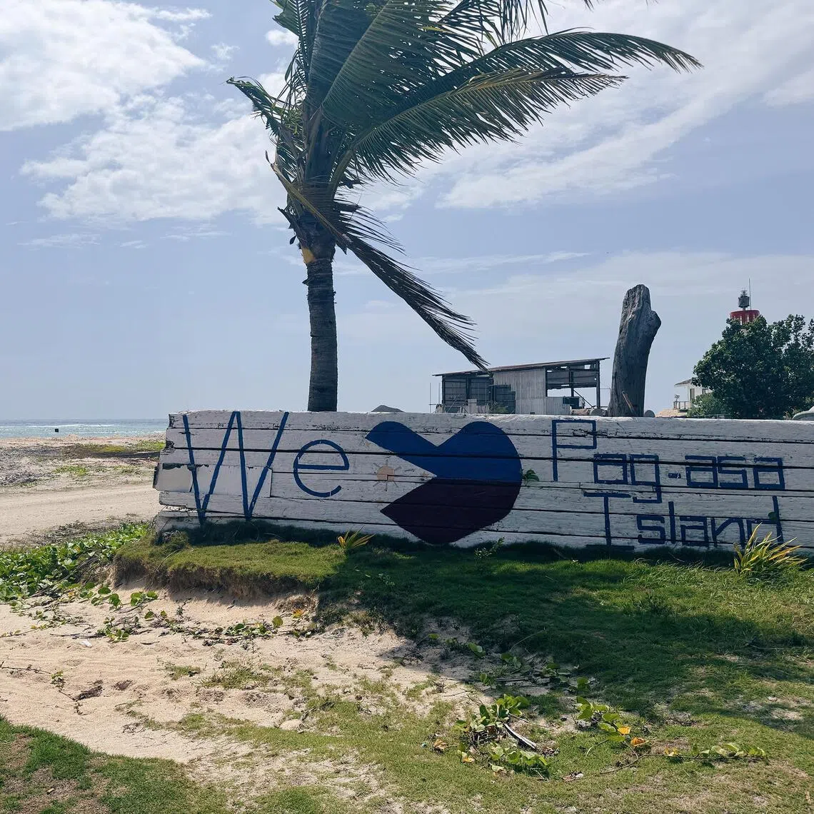 mathitu - A Chinese Coast Guard ship sails close to the western shores of Thitu Island that Filipino residents can see it from their windows. 
