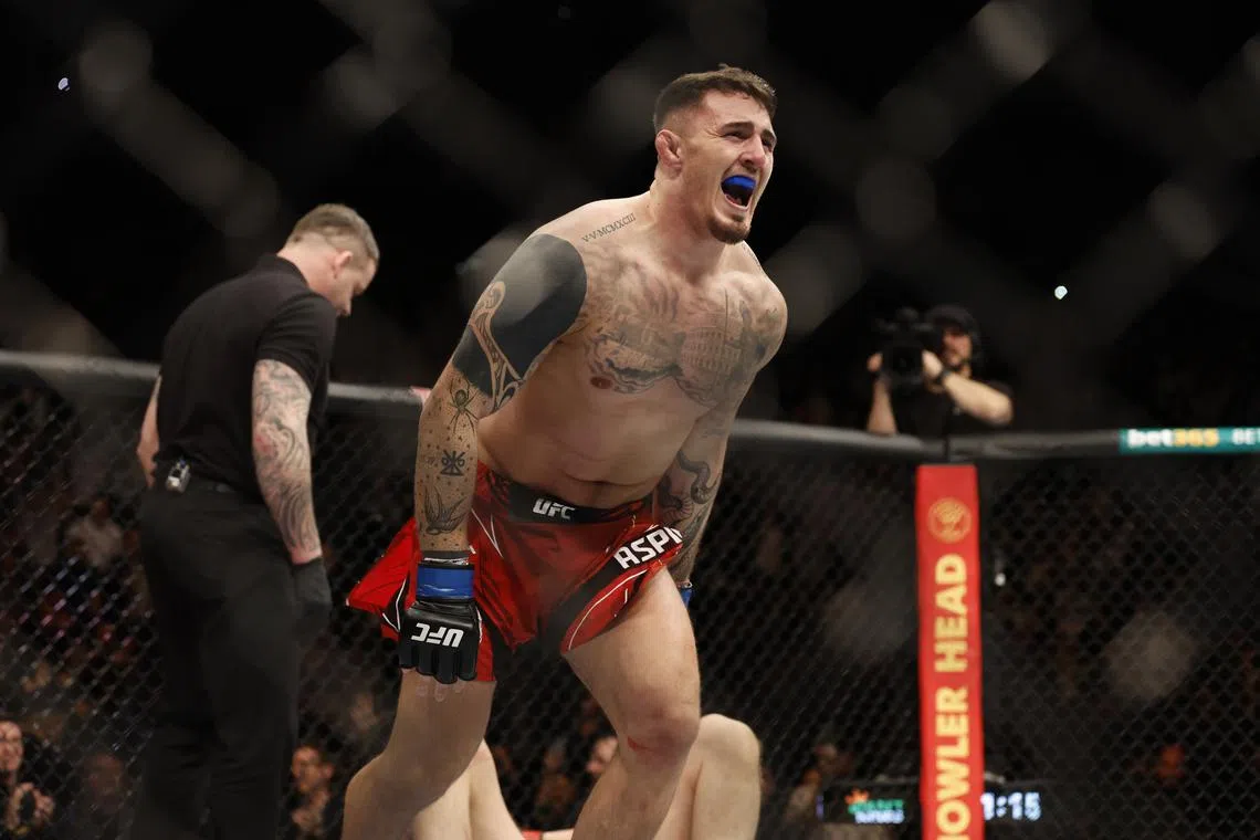 FILE PHOTO: Mixed Martial Arts - UFC - Alexander Volkov v Tom Aspinall - O2 Arena, London, Britain - March 19, 2022 Tom Aspinall celebrates winning his fight against Alexander Volkov Action Images via Reuters/Peter Cziborra/File Photo