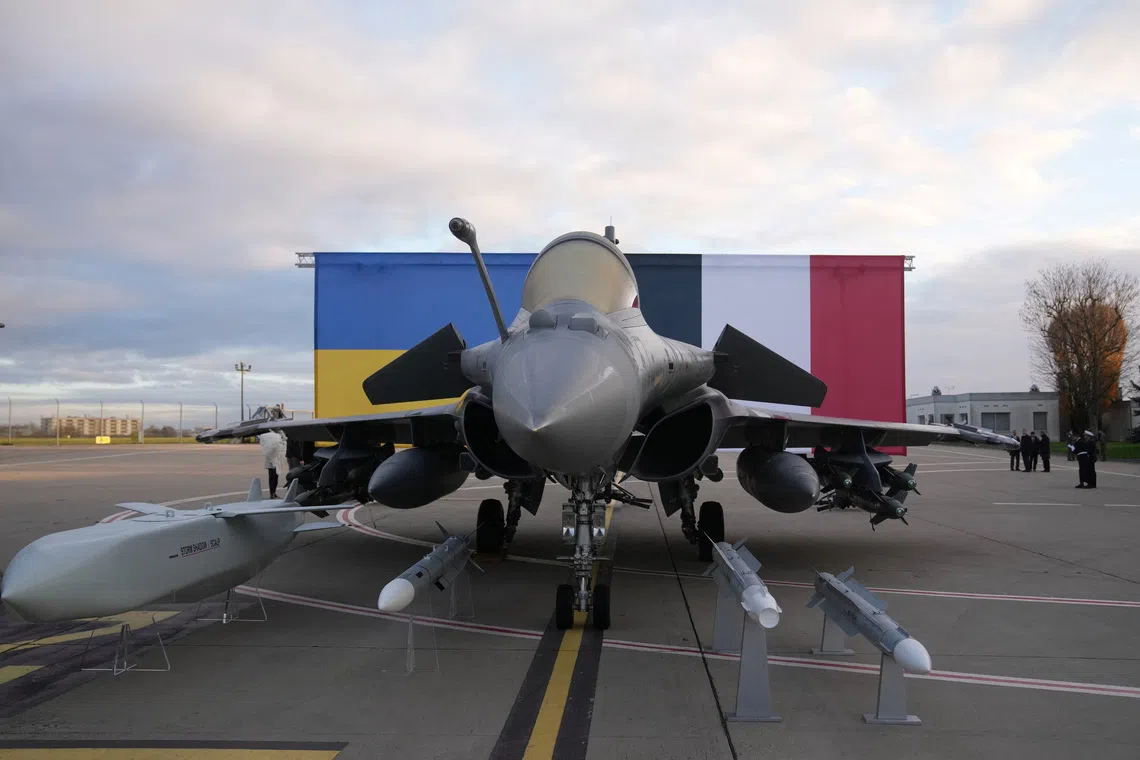 A Rafale jet fighter on the tarmac before the arrival of Ukrainian President Volodymyr Zelenskiy Monday, Nov. 17, 2025 at the Villacoublay air base near Paris.      Christophe Ena/Pool via REUTERS