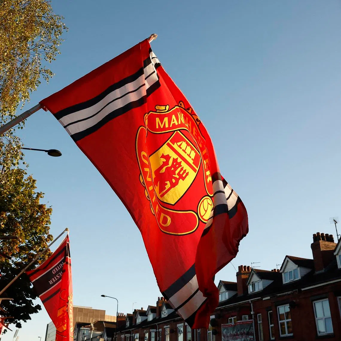 FILE PHOTO: Soccer Football - Carabao Cup - Third Round - Manchester United v Barnsley - Old Trafford, Manchester, Britain - September 17, 2024 General view of flag outside the stadium before the match Action Images via Reuters/Jason Cairnduff/ File Photo