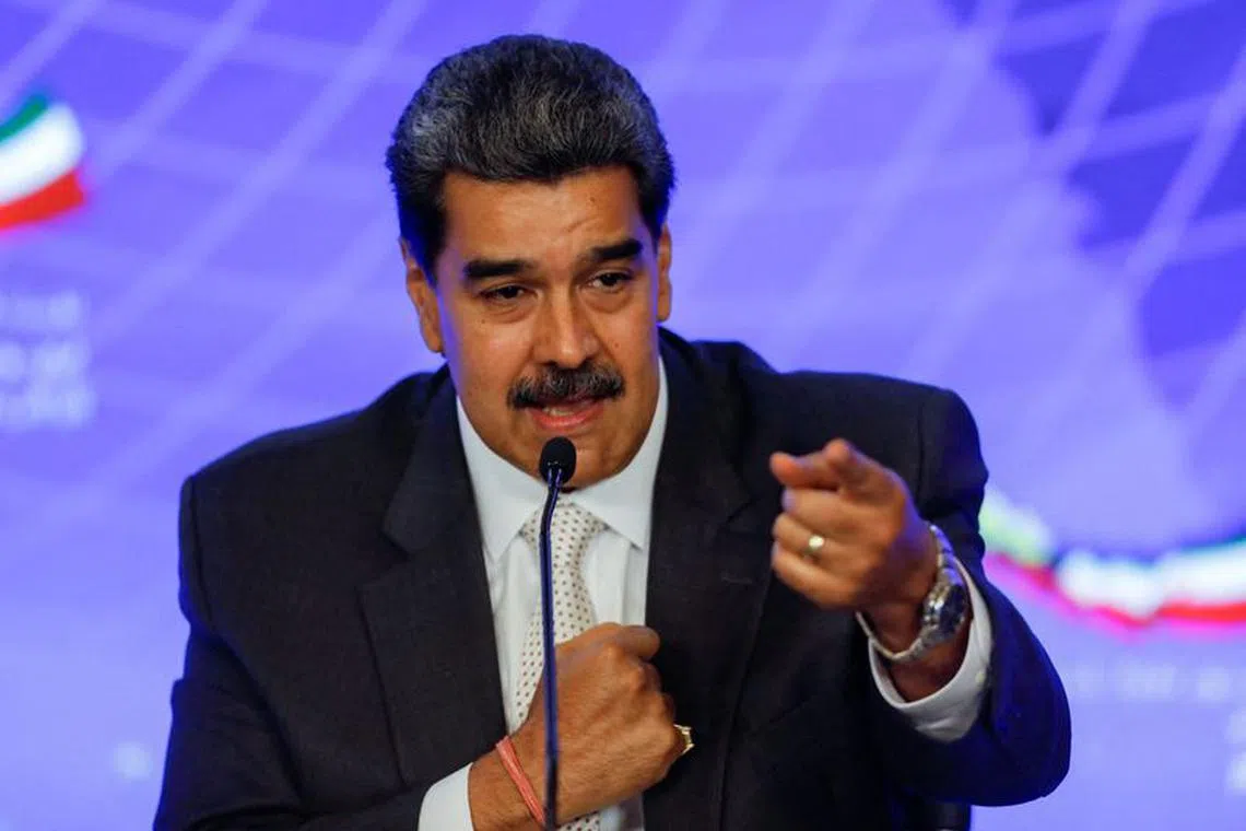 FILE PHOTO: Venezuela's President Nicolas Maduro speaks during a meeting with Iranian President Ebrahim Raisi at the Miraflores Palace, in Caracas, Venezuela June 12, 2023. REUTERS/Leonardo Fernandez Viloria/File Photo
