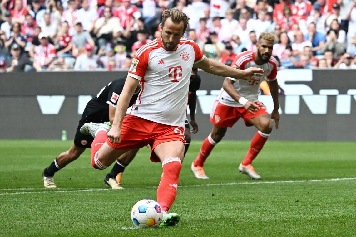 Soccer Football - Bundesliga - Bayern Munich v Eintracht Frankfurt - Allianz Arena, Munich, Germany - April 27, 2024 Bayern Munich's Harry Kane scores their second goal from the penalty spot REUTERS/Angelika Warmuth