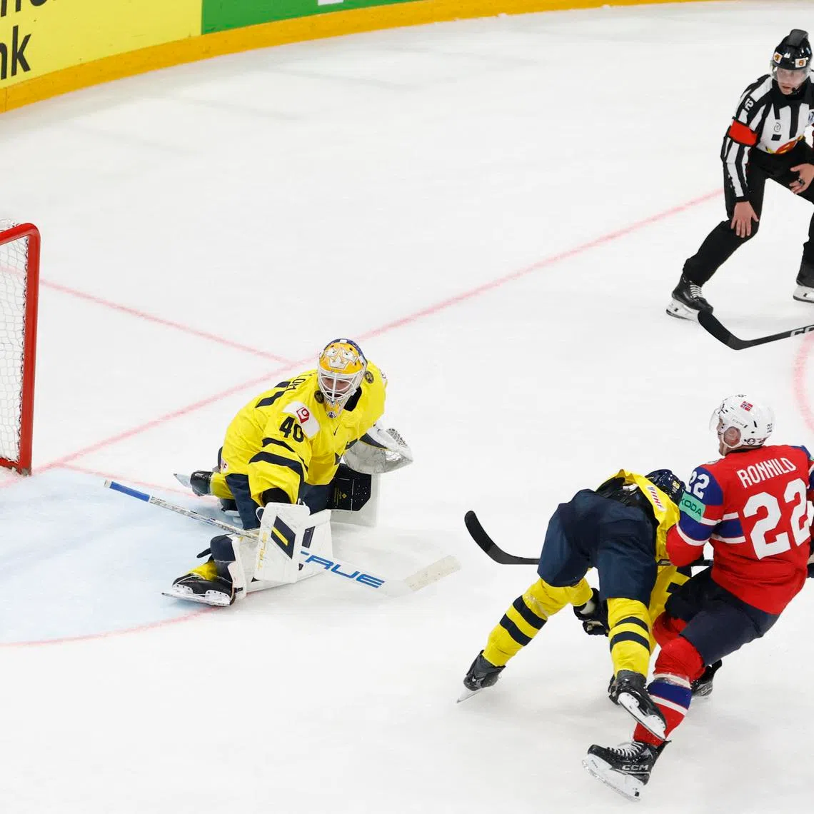 Ice Hockey - IIHF World Championships - Group B - Norway v Sweden - BCF Arena, Fribourg, Switzerland - May 23, 2026 Norway's Eirik Salsten scores their third goal past Sweden's Arvid Soderblom REUTERS/David W Cerny