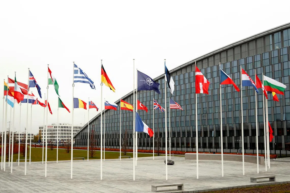 Flags of NATO member countries are seen at the Alliance headquarters in Brussels, Belgium, November 26, 2019.  REUTERS/Francois Lenoir/File Photo