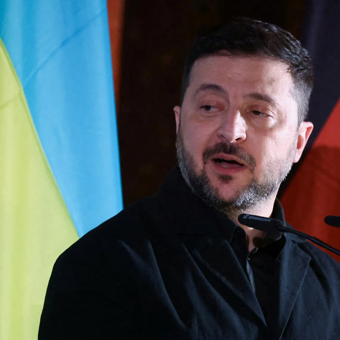 FILE PHOTO: Ukrainian President Volodymyr Zelenskiy speaks on the day he is presented with the Ewald-von-Kleist-Award, during the Munich Security Conference MSC, at the Residenz of the former Bavarian Kings, in Munich, Germany, February 14, 2026. REUTERS/Liesa Johannssen/File Photo