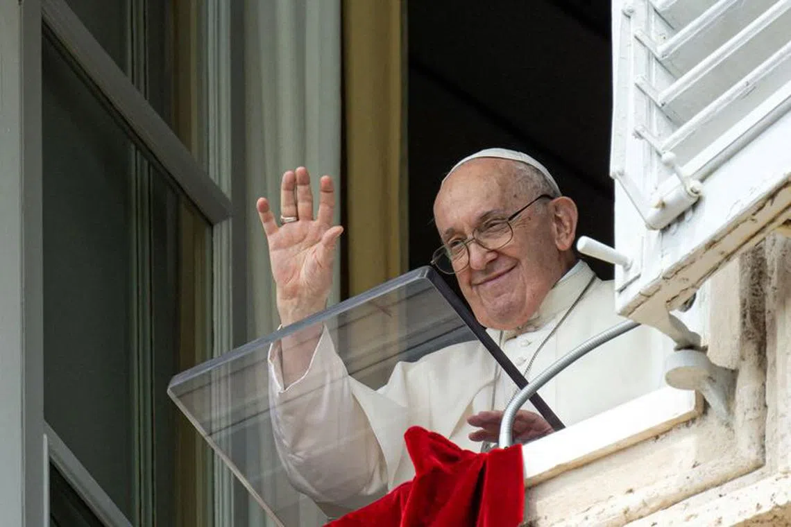 FILE PHOTO: Pope Francis leads the Angelus prayer from his window at the Vatican, August 27, 2023.  Vatican Media/­Handout via REUTERS/ File Photo