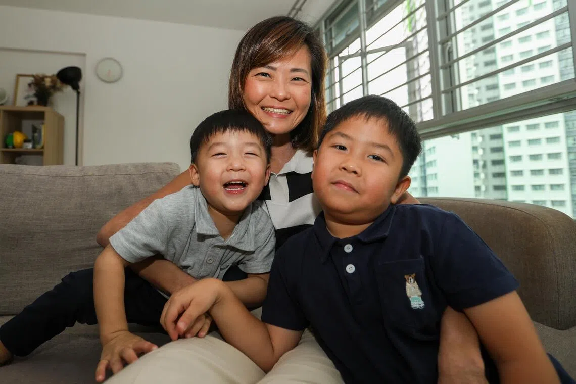 Ms Chia An An, 35, with her sons, Nathaniel Tan, 6, (right) and Timothy Tan, 3, at their home.