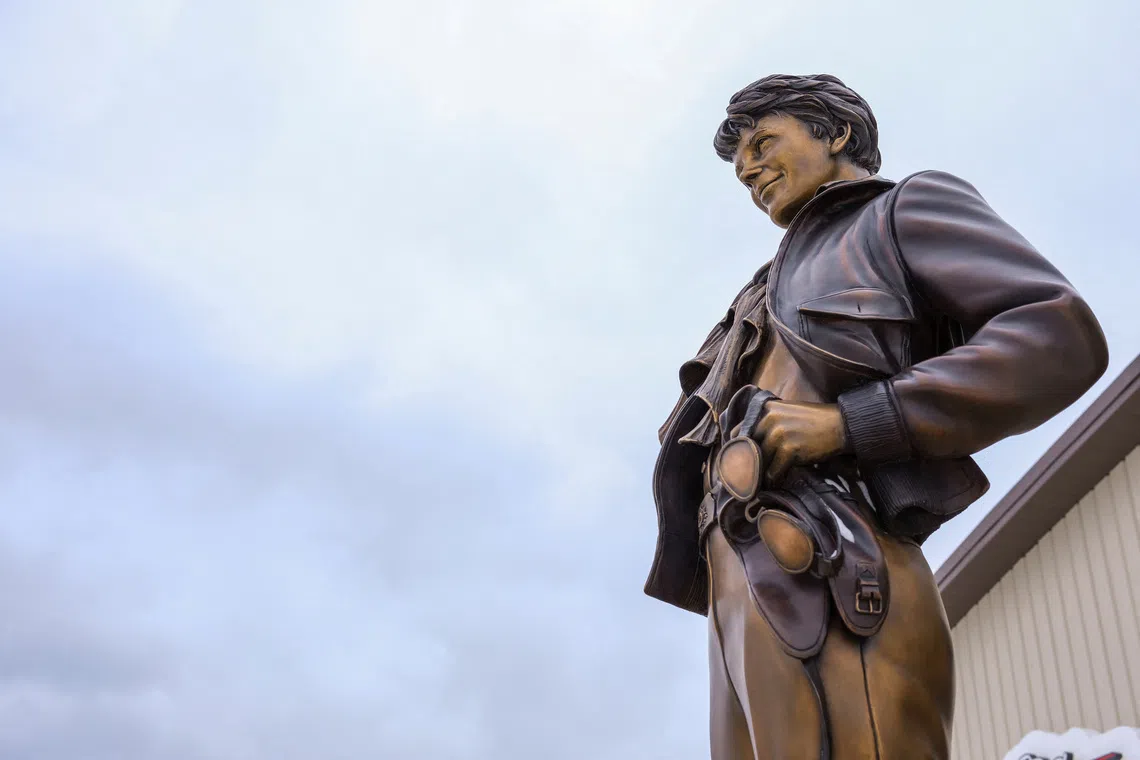 A statue of legendary aviator Amelia Earhart stands at the Amelia Earhart Hangar Museum in Atchison, Kansas.