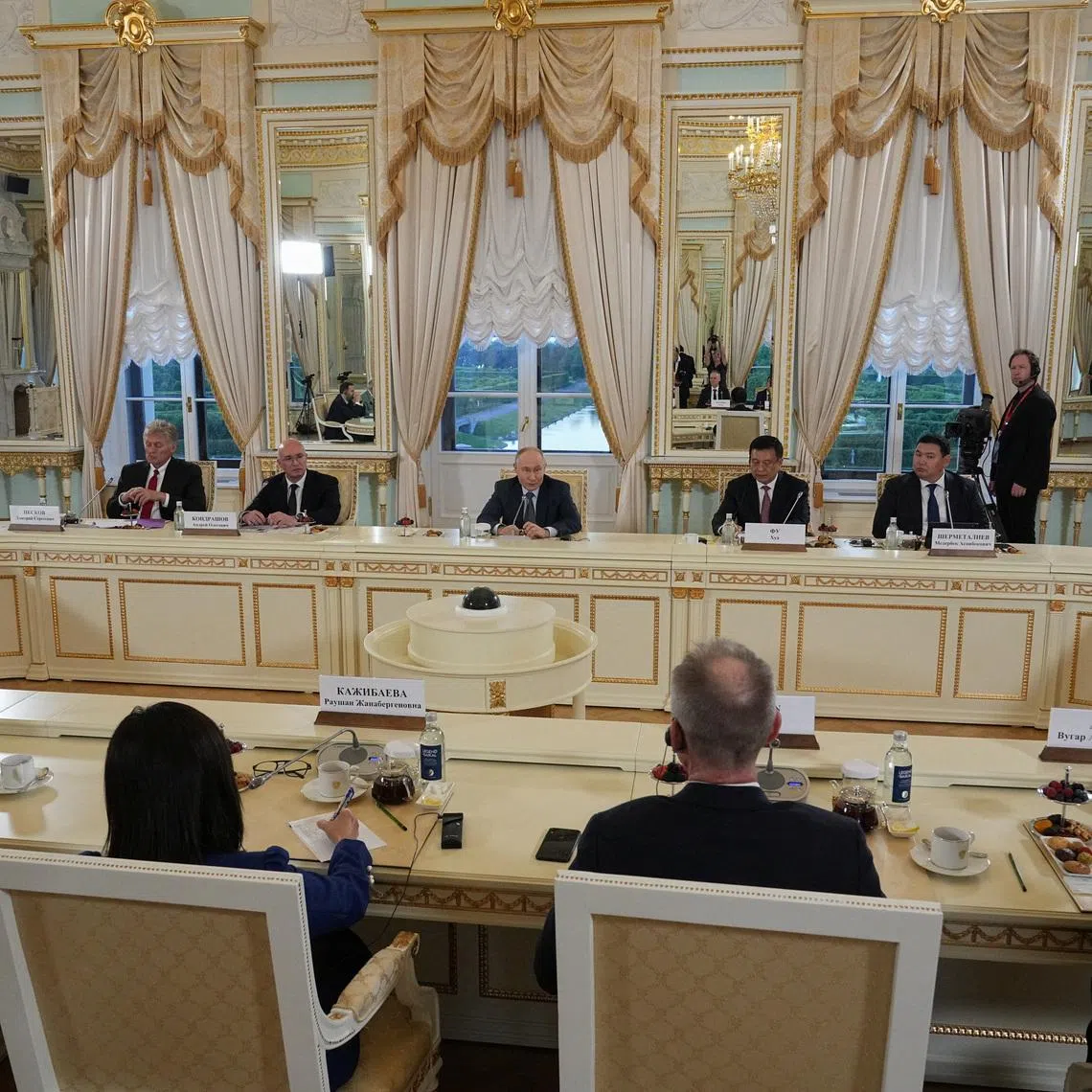 Russian President Vladimir Putin meets with representatives of international news agencies on the sidelines of the St. Petersburg International Economic Forum, at the Constantine Palace in St. Petersburg, Russia, June 4, 2026.  Dmitri Lovetsky/Pool via REUTERS