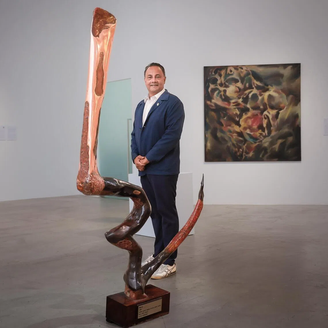 Gajah Gallery founder and director Jasdeep Sandhu with a sculpture by Lasalle College of the Arts founder Joseph McNally. 