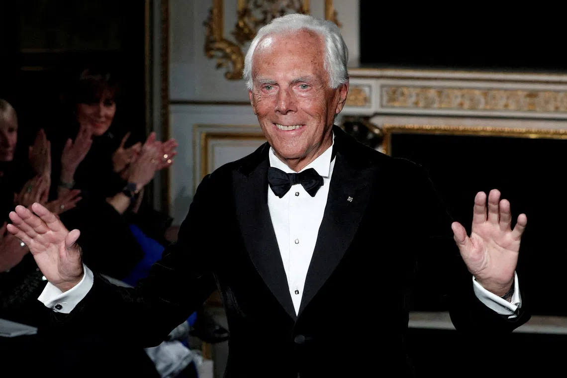 FILE PHOTO: Italian designer Giorgio Armani appears at the end of his Haute Couture Spring-Summer 2019 collection show for fashion house Giorgio Armani Prive in Paris, France, January 22, 2019. REUTERS/Benoit Tessier/File Photo