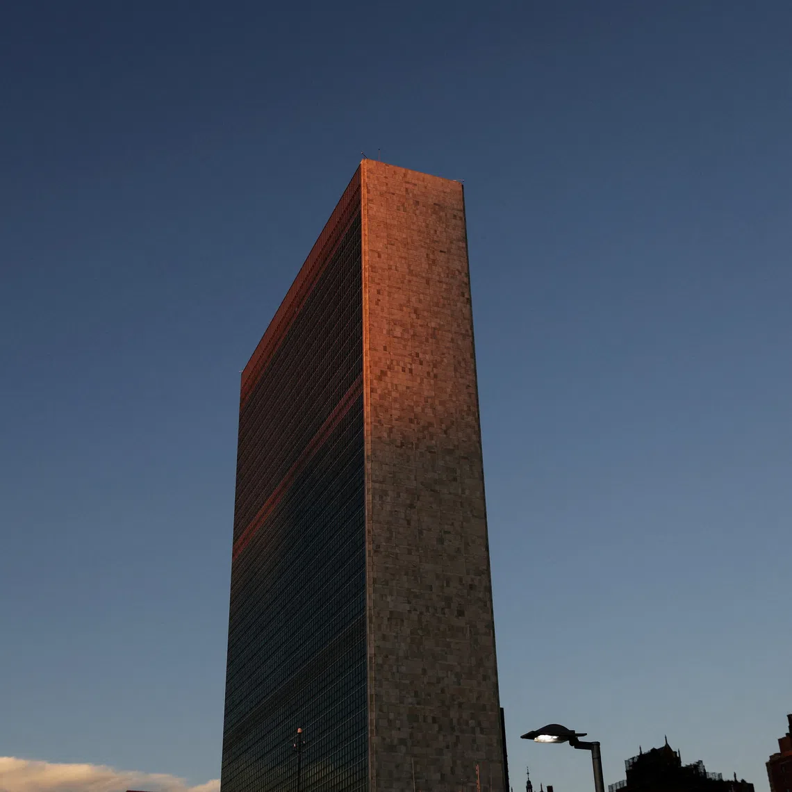 FILE PHOTO: The United Nations building is seen at sunrise during the 77th Session of the United Nations General Assembly at the U.N. Headquarters in New York City, U.S., September 21, 2022. REUTERS/Shannon Stapleton/File Photo