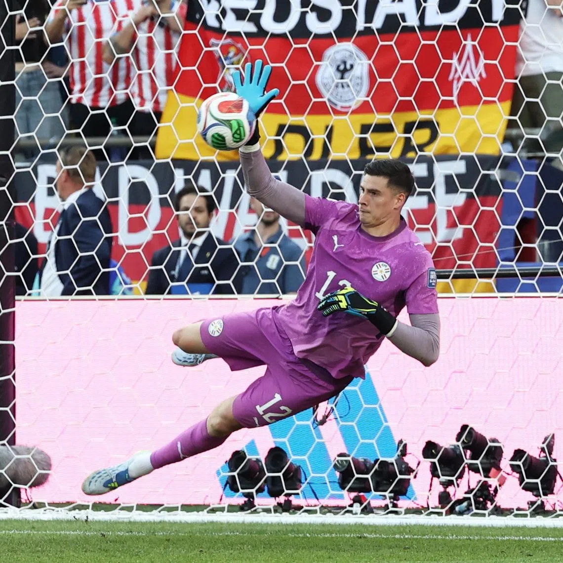 Soccer Football - FIFA World Cup 2026 - Round of 32 - Germany v Paraguay - Boston Stadium, Foxborough, Massachusetts, U.S. - June 29, 2026 Paraguay's Orlando Gill saves a penalty from Germany's Kai Havertz during the penalty shootout REUTERS/Amanda Perobelli
