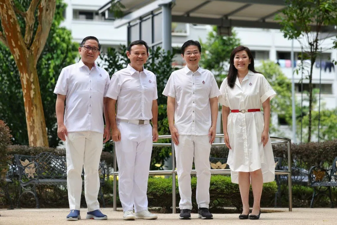 (From left) Mayor Alex Yam, Senior Minister of State for Manpower Zaqy Mohamad, PM Lawrence Wong and Ms Hany Soh at PAP Limbang branch on April 12.
