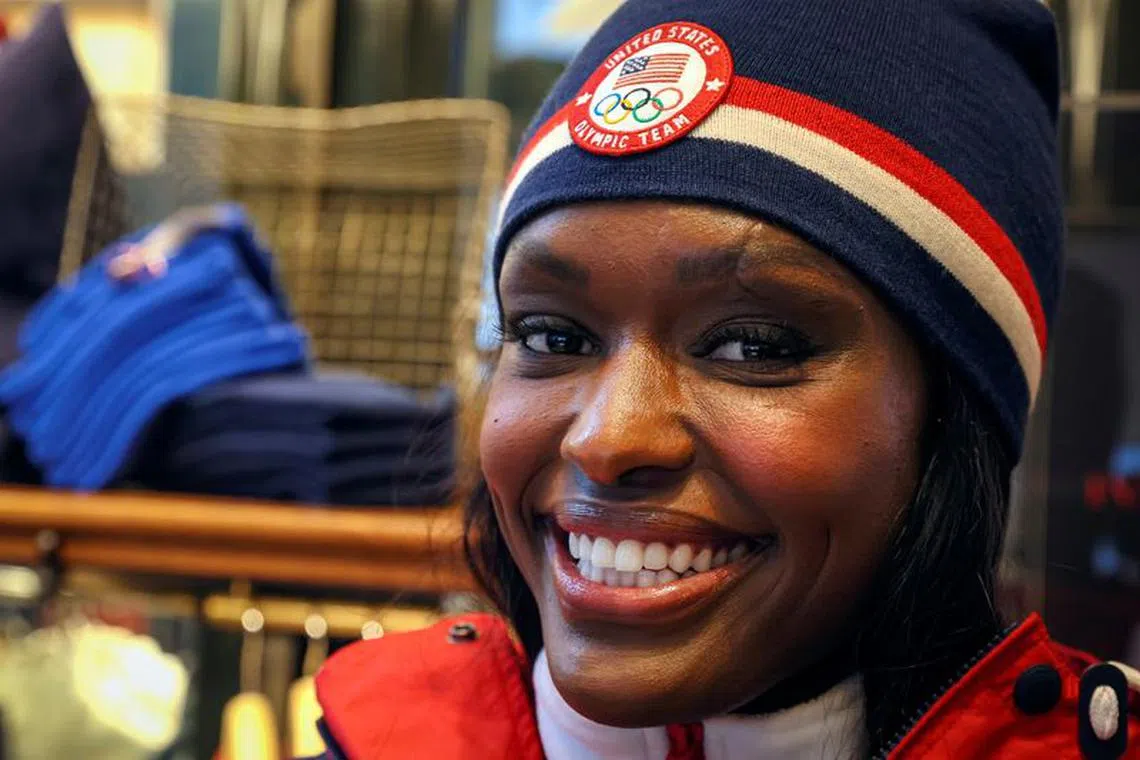 U.S. Winter Olympic bobsledder Aja Evans poses for photos wearing Polo Ralph Lauren items designed for U.S. Winter Olympic Team at the company's store in New York City, New York, U.S., January 20, 2022.  REUTERS/Brendan McDermid/File photo