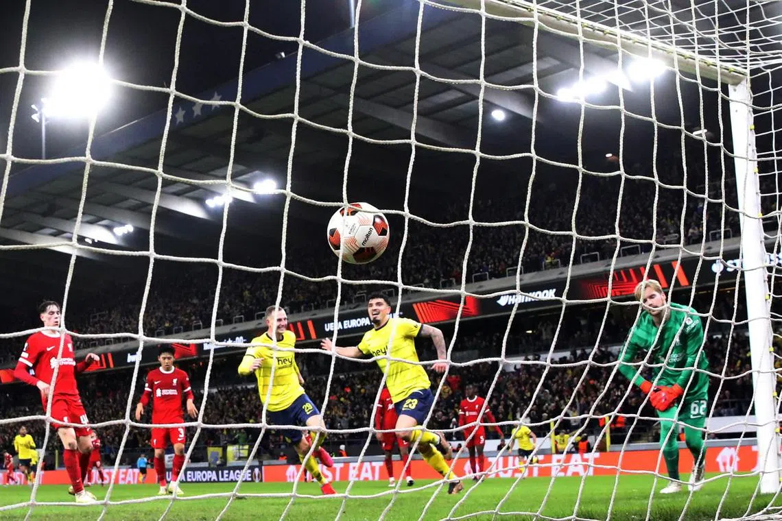Union Saint-Gilloise's Cameron Puertas scores the winning goal against a youthful Liverpool side.