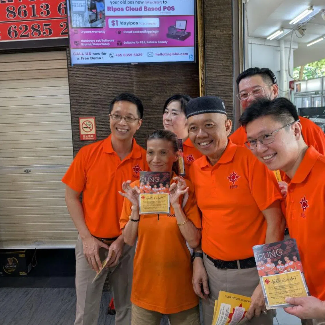 NSP chief Spencer Ng (far left) with the rest of the NSP slate for Sembawang GRC during a walkabout on April 25.