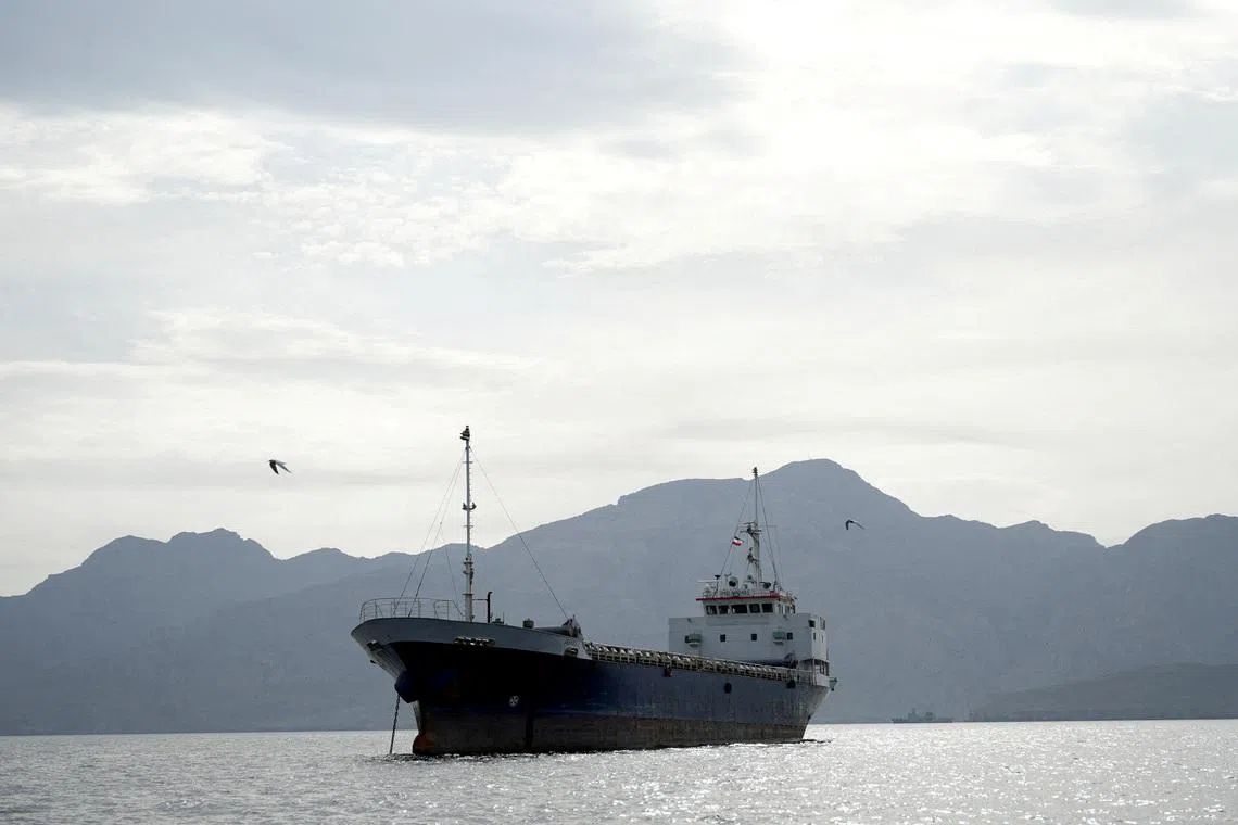 FILE PHOTO: A vessel in the Strait of Hormuz, off the coast of Oman’s Musandam province, April 12, 2026. REUTERS/File Photo