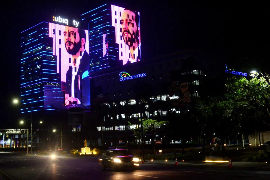 Images of El Salvador's President Nayib Bukele, who is running for reelection, are projected on buildings during the presidential and parliamentary elections in San Salvador, El Salvador, February 4, 2024. REUTERS/Jessica Orellana/Files