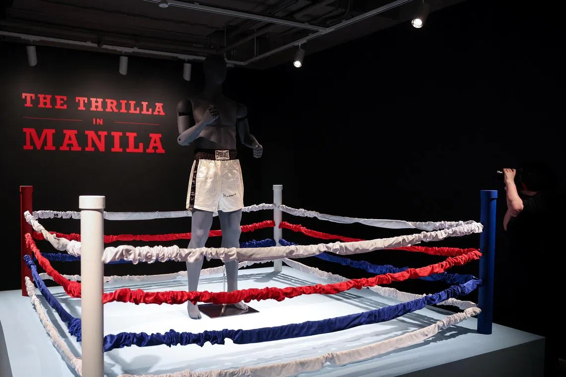 Muhammad Ali's boxing trunks from the 1975 'Thrilla in Manila' boxing match with Joe Frazier expected to be auctioned for  $4 to $6 million, stand on display at Sotheby's auction house in New York City, U.S., April 4, 2024. REUTERS/Shannon Stapleton