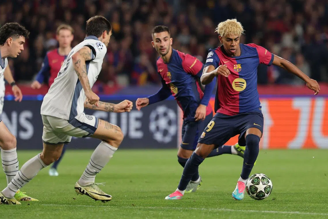 Lamine Yamal (right) led Barcelona's fightback, after Inter scored in the first and 21st minutes.