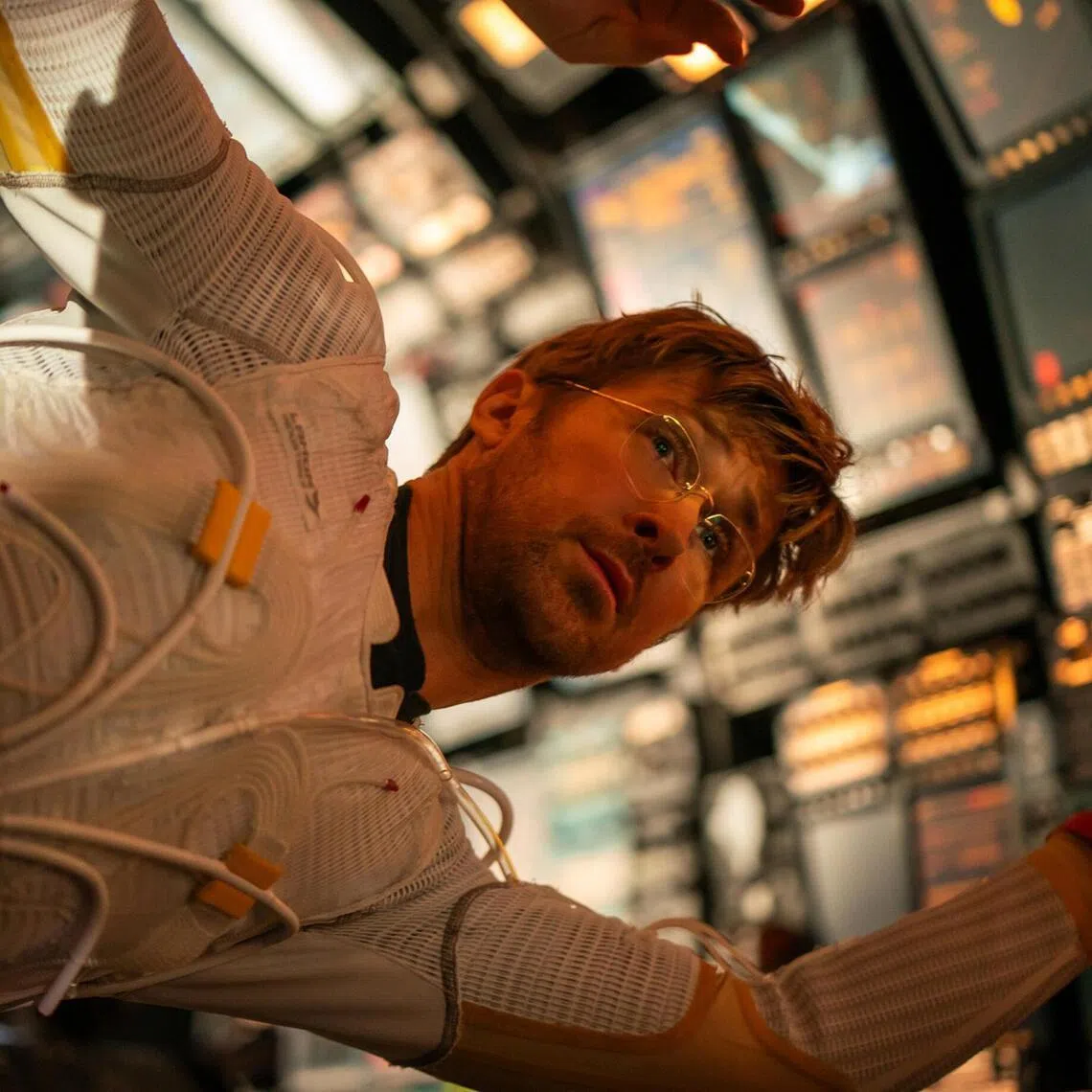 Ryan Gosling plays biologist-turned-teacher-turned-astronaut Ryland Grace in Project Hail Mary.