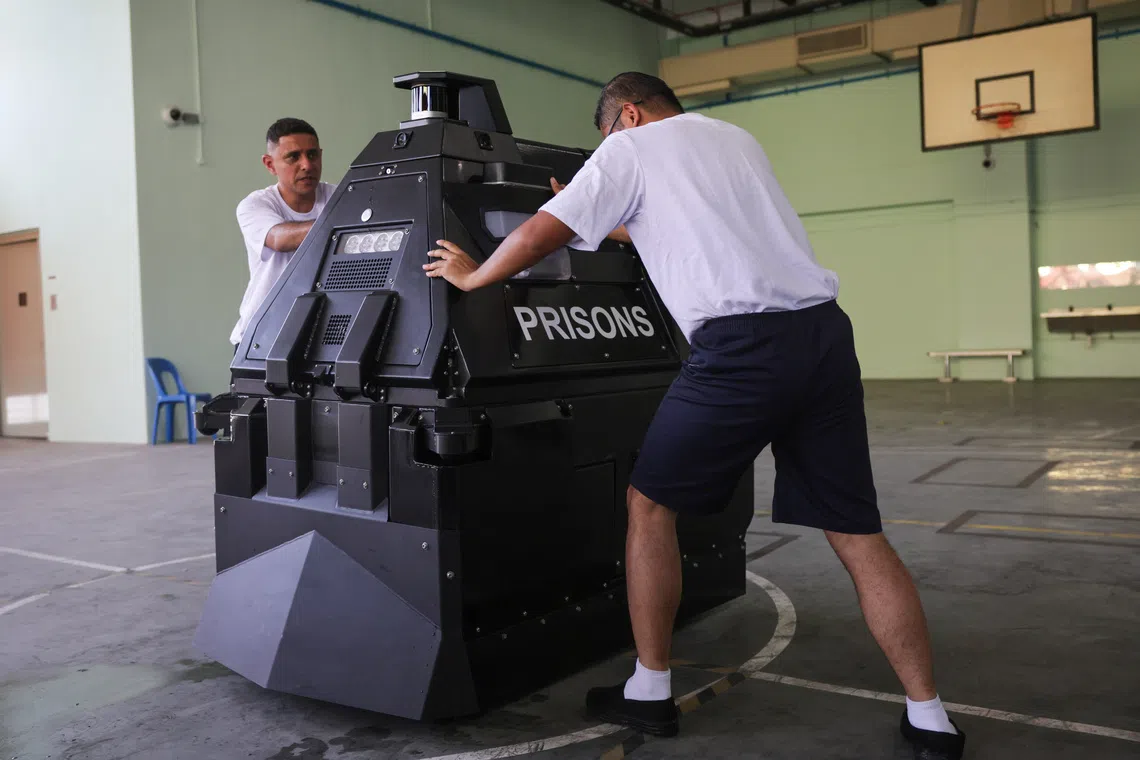 The 157cm-tall machine, called Prisons Robot To Eradicate Conflicts and Threats (PROTECT), was developed by the SPS with the Home Team Science and Technology Agency.
