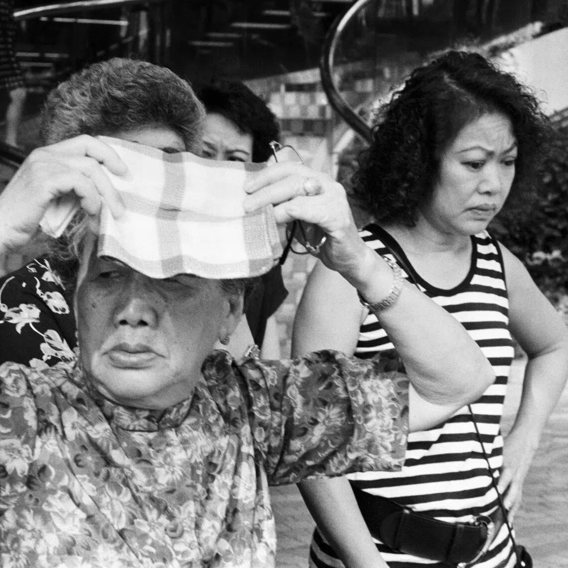 A rare selection of 63 photographs made by acclaimed film-maker and artist Tan Pin Pin in the early 1990s is on show at the 10th edition of the Singapore International Photography Festival.