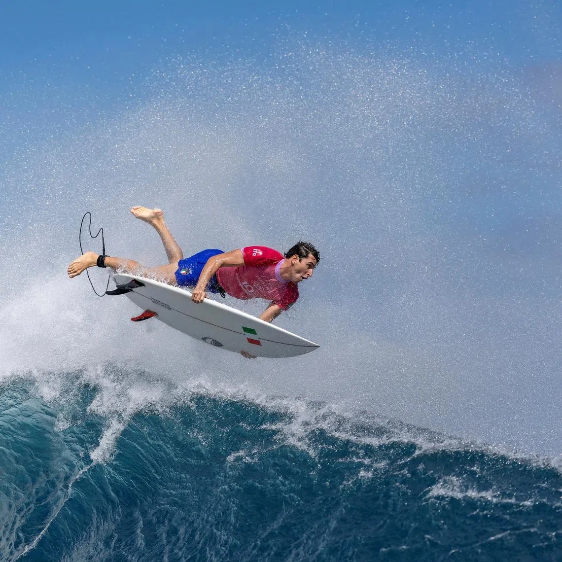 Paris 2024 Olympics - Surfing - Men's Round 2 - Heat 1 - Teahupo'o, Tahiti, French Polynesia - July 28, 2024. Leonardo Fioravanti of Italy exits a wave. Ed Sloane/Pool via REUTERS
