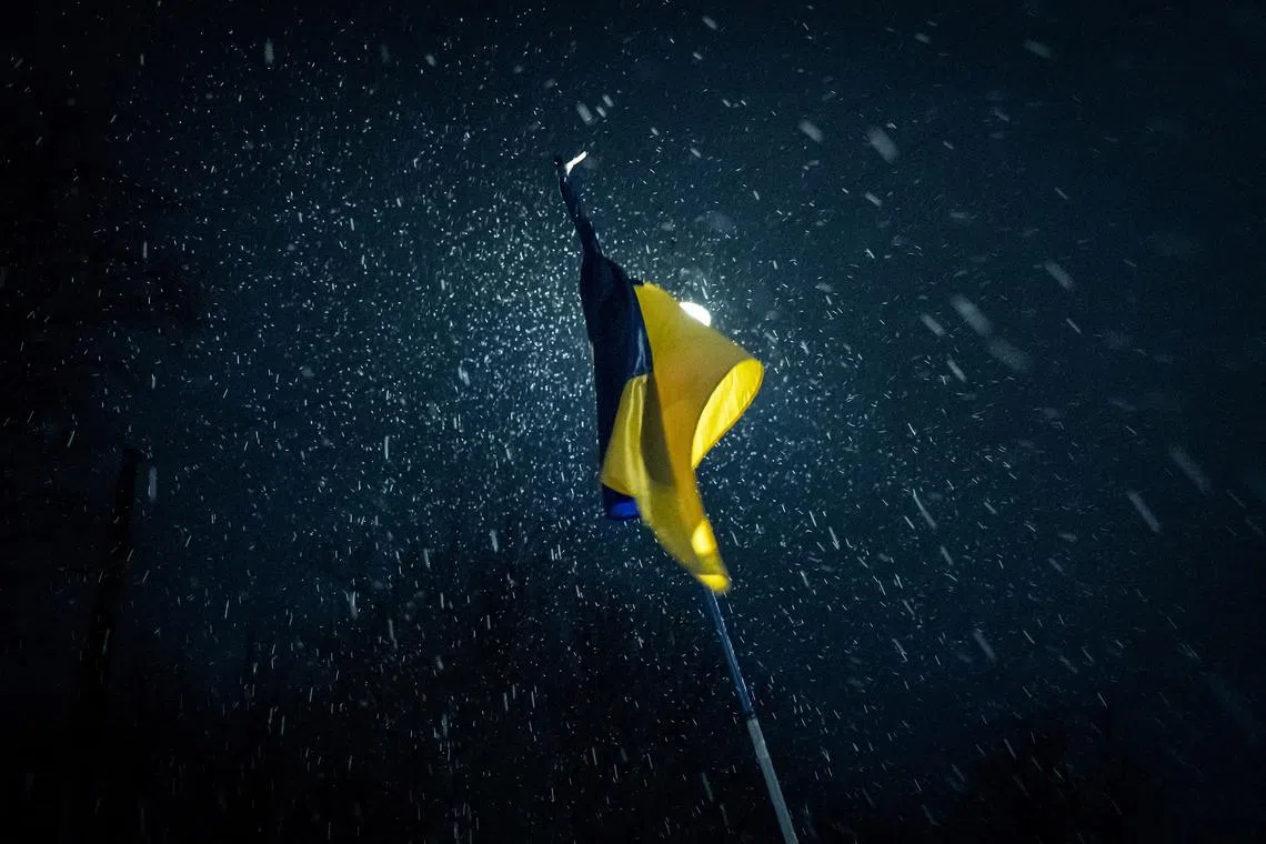 FILE PHOTO: A Ukrainian flag is pictured during a march marking the third anniversary of Russia's invasion of Ukraine in Copenhagen, Denmark, February 24, 2025.  Ritzau Scanpix/Emil Nicolai Helms via REUTERS/File Photo